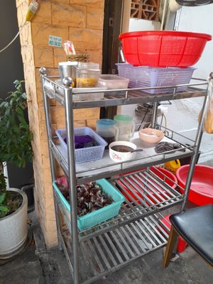 At the front is a stall and some prep area at Hana quán chay in Ho Chi Minh City