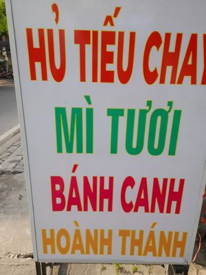 Sign outside with menu in Vietnamese only at Hu Tiệu Chay in Ho Chi Minh City
