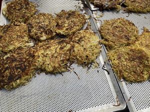 Potato pancakes with onions. Does not contain eggs, cheese.  at Old Town Market in Annecy