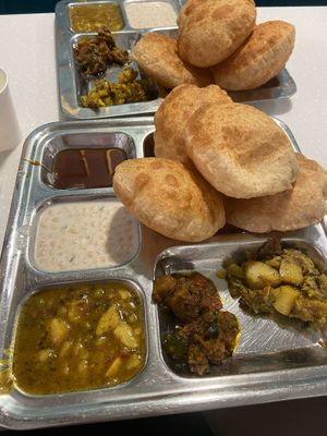 As you see on the picture, it comes with honey and a milk sauce or curd when not requested specifically, so point that out to avoid the struggle of having to send it back at SWEETS SAVOURIES RESTAURANT in Lucknow