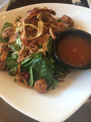 Haru Salad -- Very crisp and delicious, especially with the recommended plum dressing (just don't go too overboard with the dressing amount :P) at Grasshopper - College St in Toronto