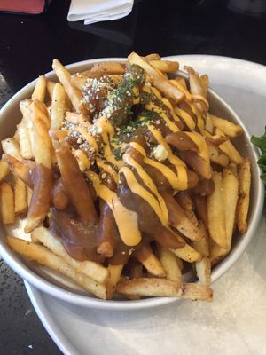 Japanese curry poutine 😍 at Grasshopper - College St in Toronto