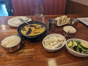 Mushu mushu, eggplant curry and sides of steamed tofu and steamed zucchini at Blossom Vegan Restaurant in Pleasanton