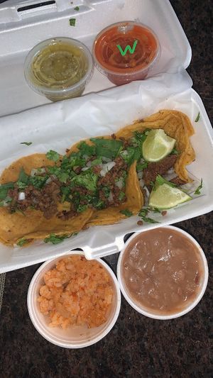 Street tacos! Added rice and beans  at The Green Tongue in Fort Worth