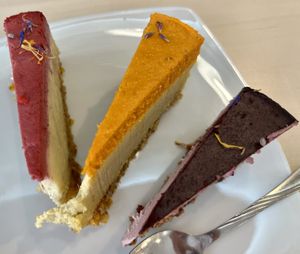 Vegan cheesecake: Blueberry & lavender, mango & sea buckthorn, and raspberry & pineapple   at Delicious Raw by Gabriela Oltean in Brasov