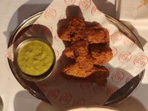 “CROQUETTES COCHONNES” HOUSE SPECIALTY

MUSHROOM & SMOKED SOY FILLING, JELLY, CRISPY COATING, SILKY RAVIGOTE. at Daimant Saint-Honoré in Paris