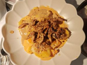 SQUASH AND CHANTERELLE AGNOLOTTI

PASTA WITH ALMOND RICOTTA, TRIPLE SAUCE, BBQ BUTTERNUT, CRISPY HERBS. at Daimant Saint-Honoré in Paris