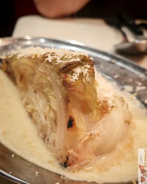 POINTED CABBAGE WITH BEURRE BLANC

BARBECUED POINTED CABBAGE, TENDER AND CARAMELISED, LEMONY BEURRE BLANC, WITH REINVENTED PECORINO. at Daimant Saint-Honoré in Paris