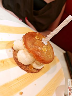 LA CALISSONNE

INSPIRED BY THE ICONIC CALISSON OF AIX-EN-PROVENCE: SOFT ALMOND BISCUIT, FLORAL DIPLOMAT CREAM, CITRUS CONFIT, CANDIED ORANGE. at Daimant Saint-Honoré in Paris