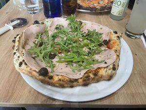 Vegan mortadella
San Marzano tomato, vegan mozzarella, vegan mortadella and truffle.
  at Spiga Napoletana in Toledo