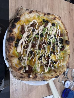 Vegetable pizza with pumpkin sauce and almond cream  at Spiga Napoletana in Toledo