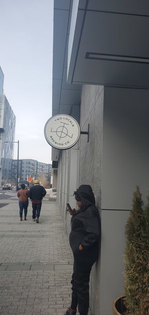 Sign outside at Two Locals Brewing in Philadelphia