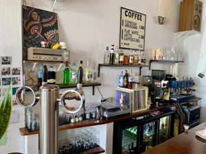 Turntable, classic vinyl, cocktails offered in the evenings and at brunch on weekends.   at What The Folk in Caldas Da Rainha