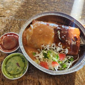 Vegan Burrito served wet with half ranchera sauce and half enchilada sauce.  at Chiquita Rosita's in Barstow