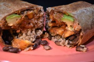 Vegan Plantain Burrito:
in a whole wheat tortilla, with a fried plantain, black beans, brown rice, salsa fresca & avocado, Then, we grilled for you. :) at Adelitas Taqueria in San Jose