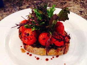 Balsamic roasted tomato bruschetta with walnut and rocket pesto at O' Joy in Shrewsbury