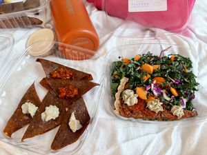 Ravioli and pizza+saladd  at Conscious Kitchen Atx in West Lake Hills