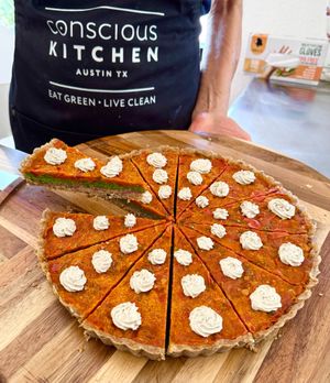 5 Layers of Love Pizza! We make the curst from nuts and herbs from our garden. Then layer, tapenade, pesto, marinara, and goatless goats cheese. Beyond flavorful! at Conscious Kitchen Atx in West Lake Hills
