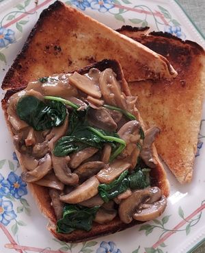 Miso garlicky mushrooms with spinach on toast at Tommy's Community Kitchen and Bakery CIC in Worthing