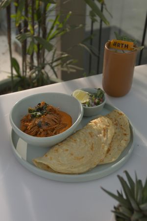 Ghee Roast Kathal Served with Malabar Paratha at Arth - Food For Your Soul in Gurgaon