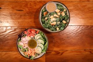 Our Garden Salad with our Kale Cesar. at Farm Burger in Memphis