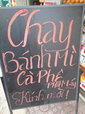 Notice outside at Banh Mi Chay Phe Van in Ho Chi Minh City