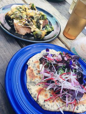 Brussels toast with tofu cheese and tempeh flatbread at Sneaky Pickle & Bar Brine in New Orleans
