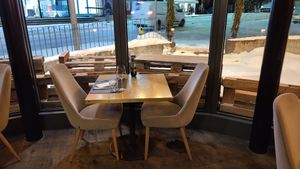 interior mood, table at the window front at Stau in Davos