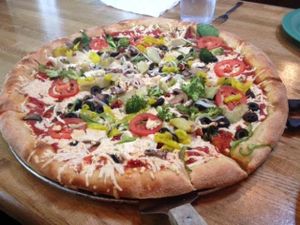 Mega Veggie pizza, vegan style. Jusk for vegan cheese and nix the butter and parmesan on the crust. at Mellow Mushroom in Chattanooga