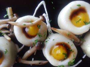 Potato dumplings filled of mushrooms, pumpkin purea, cashew sauce, mushrooms sauted and their caramel. at Hungry Buddha - Maybe closed in Shaxi