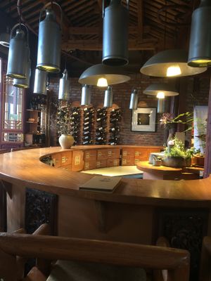 Inside with round table! You can watch Chefs making pizza there at Hungry Buddha - Maybe closed in Shaxi