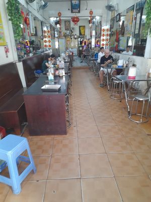 Each table has a built-in stove for hotpots at Tịnh Tâm in Ho Chi Minh City