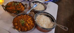 Two of the vegan options from the separate vegan menu, chana masala and vegetables. at Himalaya Sono in Norwalk