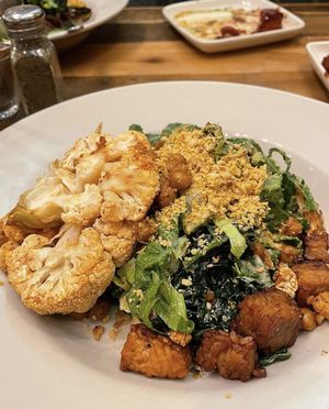 ORGANIC VEGAN CAESAR
Organic romaine | organic kale | organic tempeh “bacon” bits garlic | roasted organic chickpea croutons | vegan ‘parmesan’ creamy cashew dressing  at French Meadow Bakery & Cafe in Minneapolis