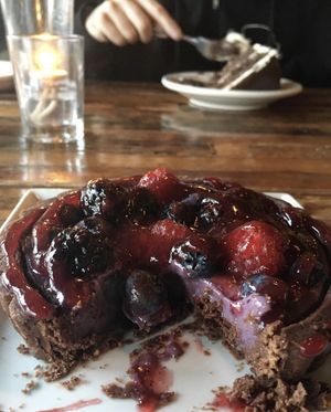 BERRY CREAM TART
Venezuelan fair-trade single-origin chocolate and ground almond crust filled with blueberry and raspberry cream, topped with fresh berries 😍  at French Meadow Bakery & Cafe in Minneapolis