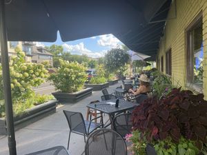 Lovely outdoor seating with flower boxes    at French Meadow Bakery & Cafe in Minneapolis