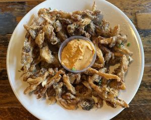 Shroomy Calamari with chipotle sauce (deep fried oyster mushrooms) 💚  at French Meadow Bakery & Cafe in Minneapolis