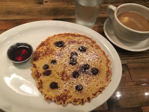 Cornmeal pancake and oatmeal cappuccino  at French Meadow Bakery & Cafe in Minneapolis