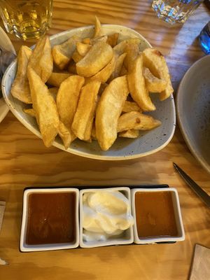 Patatas con salsas  at Entre Pedras in Santiago De Compostela