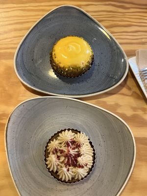 Lemon pudding and pistachio/ strawberry - both on a biscuit base   at Entre Pedras in Santiago De Compostela