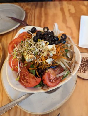 Salad with vegan cheese at Entre Pedras in Santiago De Compostela