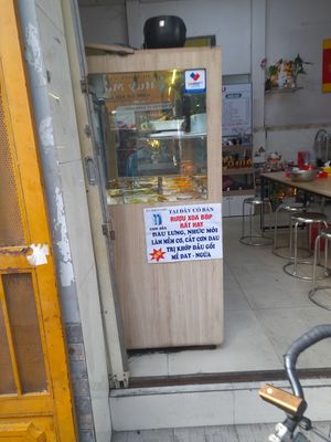 Looking in. Com chay stall near the entrance at Thiền Tinh in Ho Chi Minh City