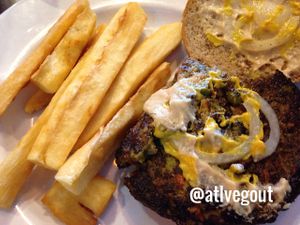 Mediterranean vegan burger with yucca fries at FuegoMundo in Sandy Springs