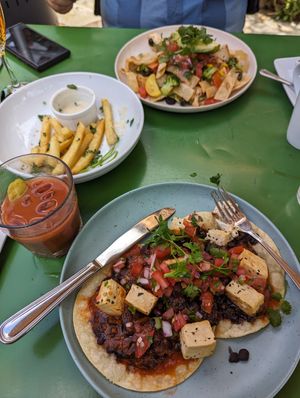 Vegan Chilaquiles, Vegan Huevos Rancheros, and fries with vegan truffle aioli at Robin's Restaurant in Cambria