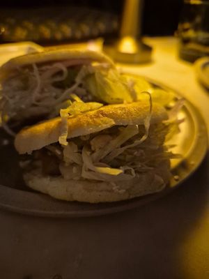 Mock meat rou jio mao. It's a rice flatbread with mockmeat, cabbage, peanuts etc (ask for it be to prepared vegan) at The Dimsum Room in Mumbai