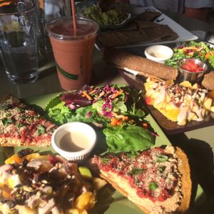 pizza, tacos, and chips and dip at Healthy Sins Vegan Cafe in Lockport