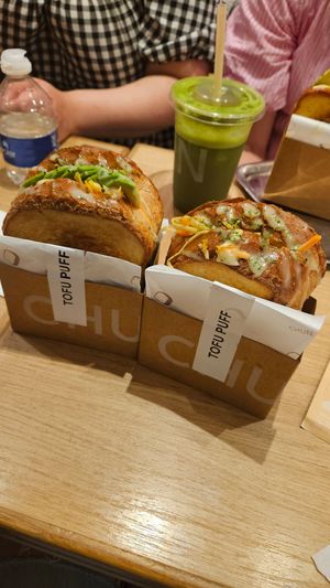 Tofu puff toasties, one with avocado added (right) one without (left) at Chun Café Berenstraat in Amsterdam