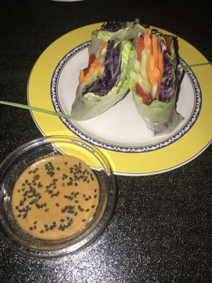 Spring rolls from the Indian menu, delicious sesame seed dipping sauce  at Lo Que Hay Cafe in Merida