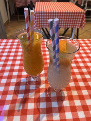 lychee (right) and mango (left) drinks  at Cmočkarna - Dumpling Lady in Ljubljana