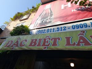Main sign outside at Hỷ Lạc Quan in Ho Chi Minh City